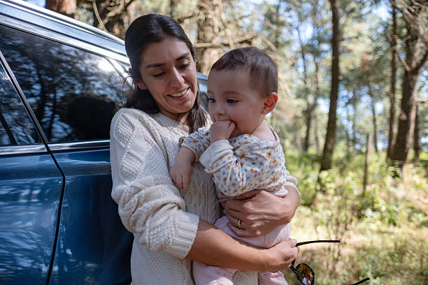 istock Mother and daughter on a hike through the forest enjoying nature 2247802763