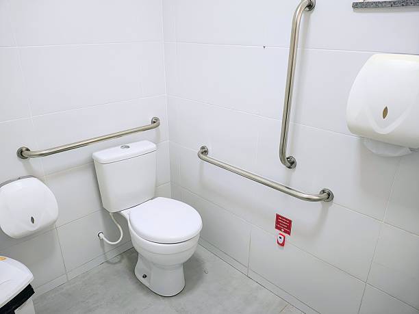 istock Bathroom in an establishment equipped with grab bars for people with disabilities. Accessible bathroom. 2247803591