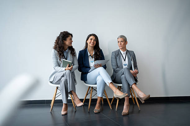 istock Businesswomen waiting for job interviews in corporate setting 2247803947