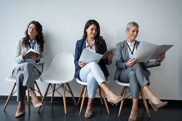 istock Professional women preparing for job interview in waiting room 2247803990