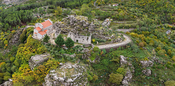istock Aerial close view of Rubik Monastery and its stone ruins perched on rugged cliffs. 2247806329