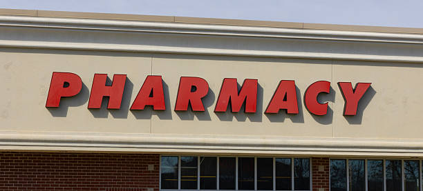 istock Pharmacy sign banner for web site or document. A pharmacy is a place where medicines are compounded or dispensed. 2247806784