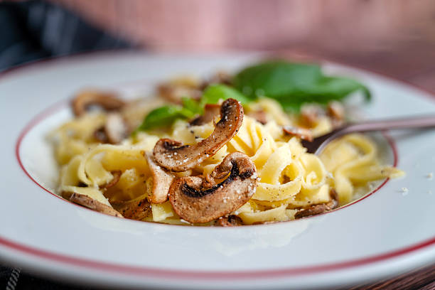 Tagliatelle pasta with  parmesan and mushrooms