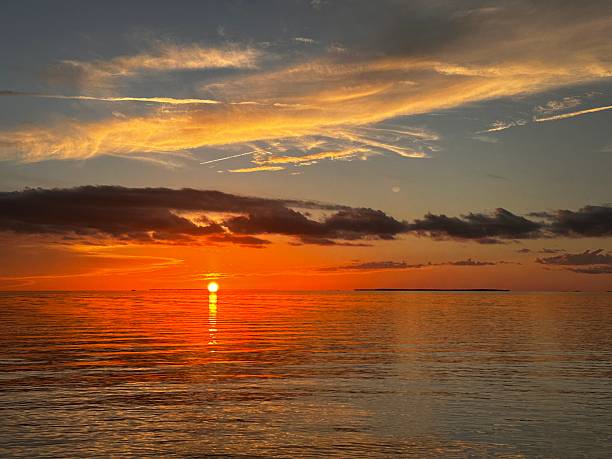 Sunset in the Florida Key with Boats, Docks and iconic sunsets.