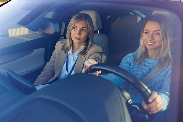istock Driving Lesson Success with Confident Student and Calm Instructor 2247823056