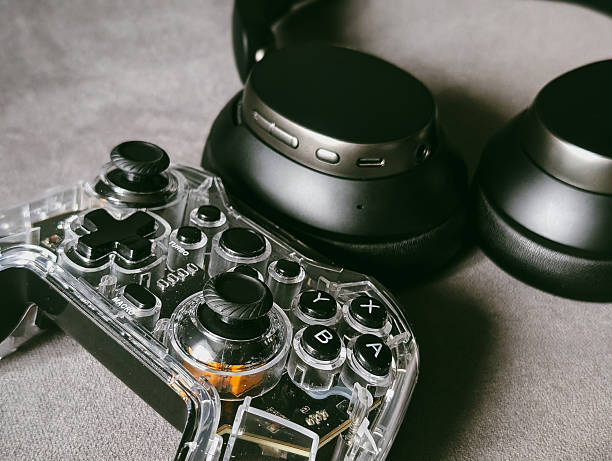 istock macro detail shot of transparent game controller d-pad and buttons 2247826836