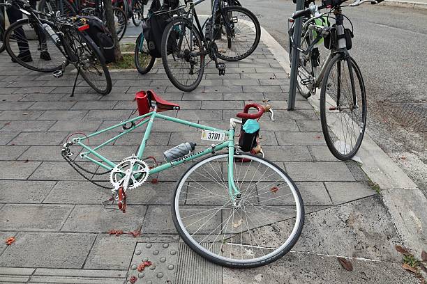 Rome, Italy – 16 November 2025. A damaged bicycle lies on the ground during a road safety demonstration, as citizens call attention to cyclist risks and demand safer streets and better urban mobility measures