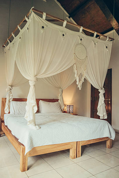 istock Traditional balinese cozy canopy bed 2247834369