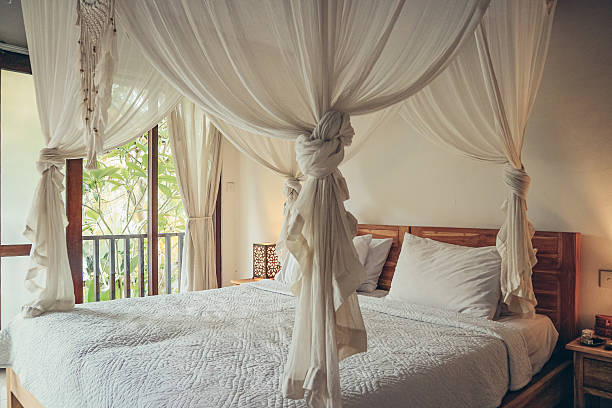 istock Traditional balinese cozy canopy bed 2247834372