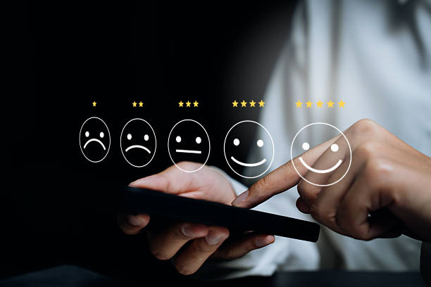 istock Hand choosing smile rating icons, customer satisfaction insight, emotional feedback analysis, service improvement mindset, experience evaluation awareness, rating review concept 2247845822