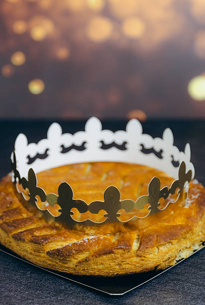 istock Delicious almond royal galette with crown on table with bokeh. 2247847063