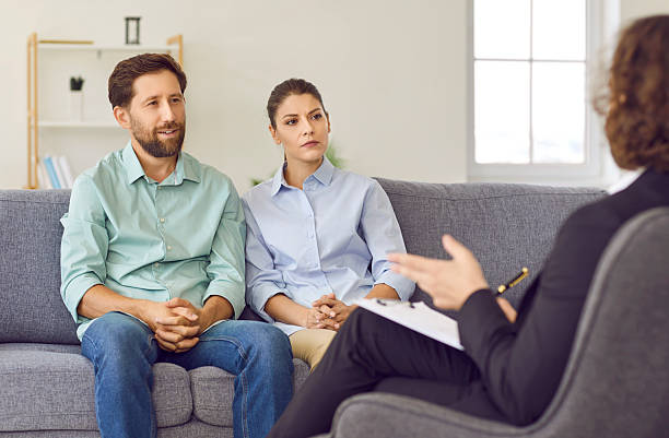 istock Man and woman discussing their relationship problems with their psychologist or psychotherapist 2247850454