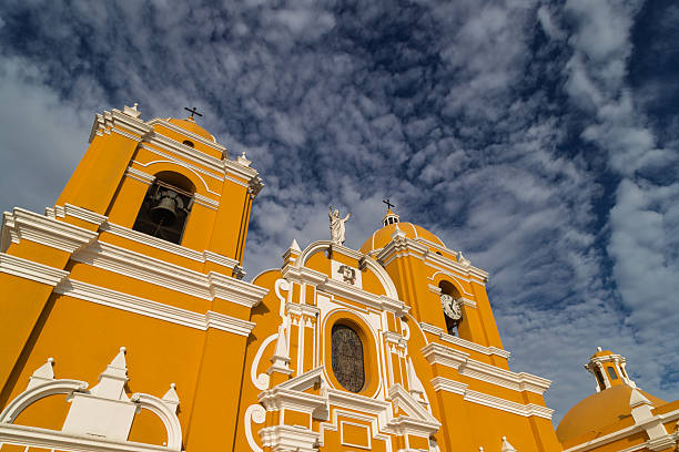 istock Yellow cathedral facade in Trujillo, Peru with colonial architecture and dramatic cloudy sky 2247851378