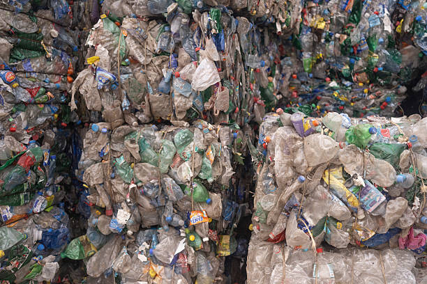 istock Environmental concept image showing stacks of pressed plastic bottle waste 2247856569