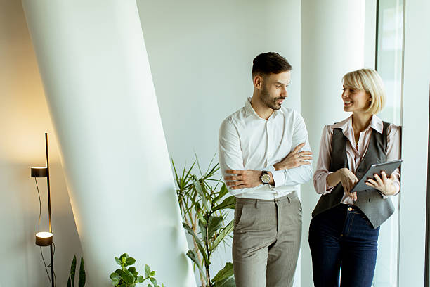 istock Business meeting between colleagues in a modern office environment 2247856698