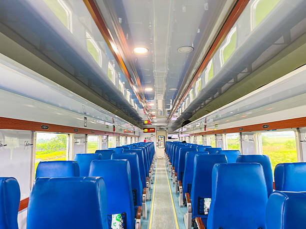 istock Empty Blue Passenger Seats in Modern Train Carriage Interior, Public Transport Perspective 2247857313