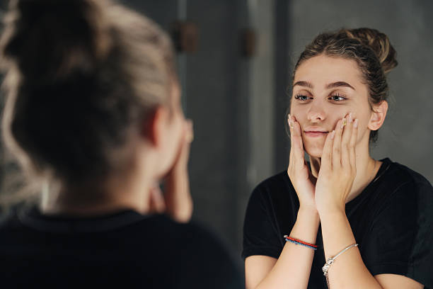 istock Caucasian woman practicing makeup under expert lighting conditions 2247858340