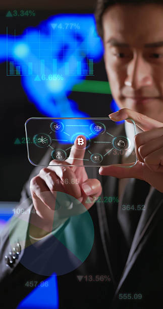 istock Businessman using transparent smartphone with Bitcoin hologram concept 2247861130