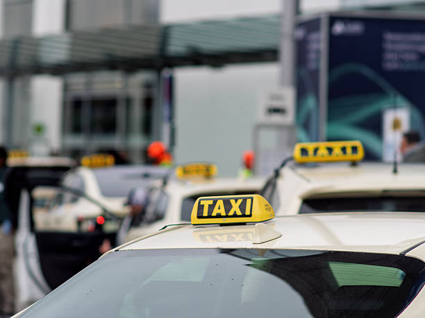 istock Taxi Queue at Busy Airport Terminal Ready for Passengers 2247863261