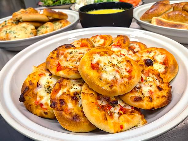 Fatayer Middle Eastern snack menu, mini pizza or pizzetta, and garlic bread that is very crispy and savory.