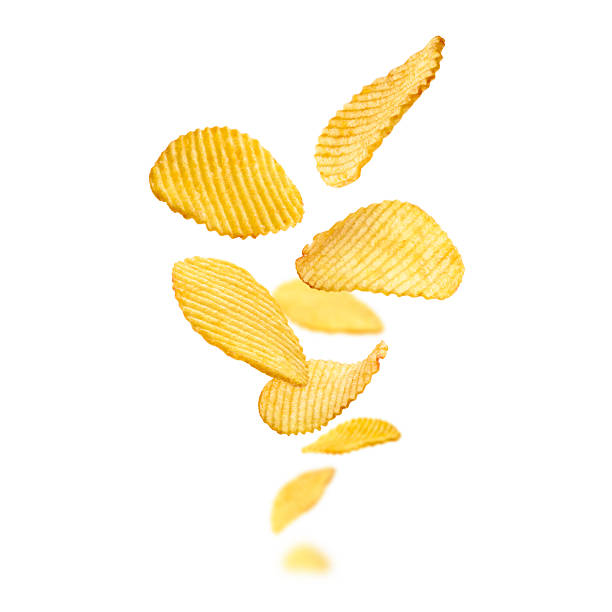 istock Fluted potato chips levitate on a white background 2247870390
