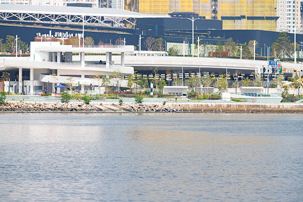 istock Layered Waterfront Cityscape with Overpass and Greenery 2247875034