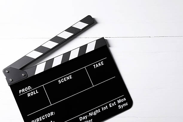 istock Clapperboard on white wooden table, top view. Space for text 2247876766
