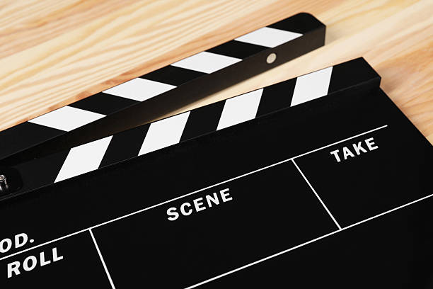 istock One clapperboard on wooden table, closeup view 2247876781