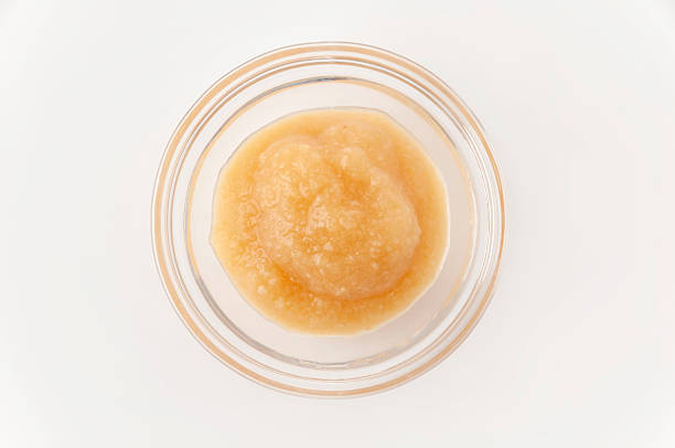 istock Fresh Grated Raw Garlic Paste in Glass Bowl 2247878163