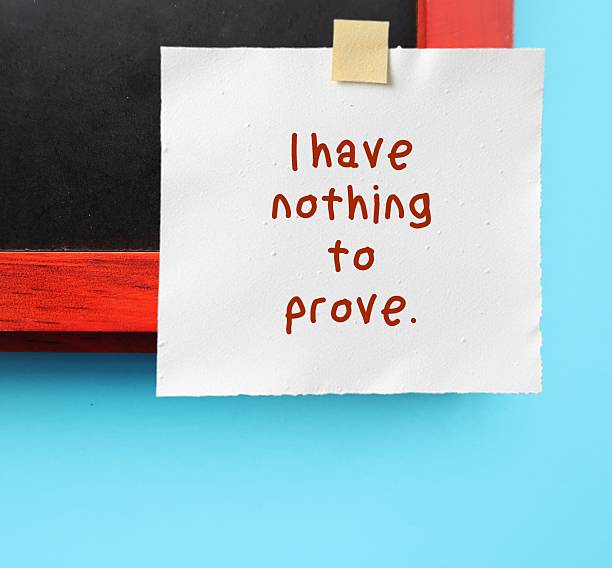 istock Photo frame with sticky note written - I have nothing to prove - Self-validation affirmations to boost self-worth - stop worrying about what others think 2247879095