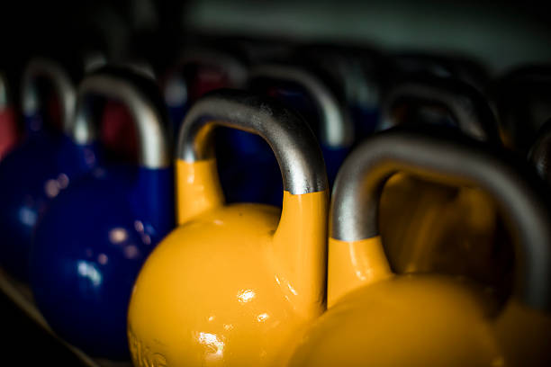 istock Selective focus on row of cowbell weights in gym 2247882722