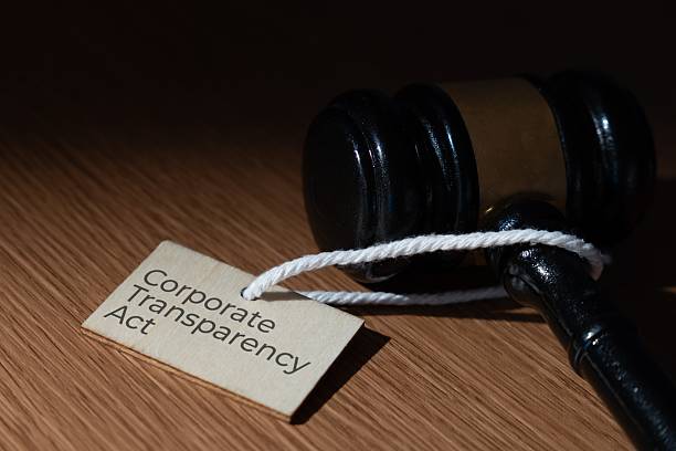 istock A wooden gavel next to a tag labeled Corporate Transparency Act. 2247884057