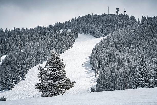 several ski runs and slopes on a beautiful day