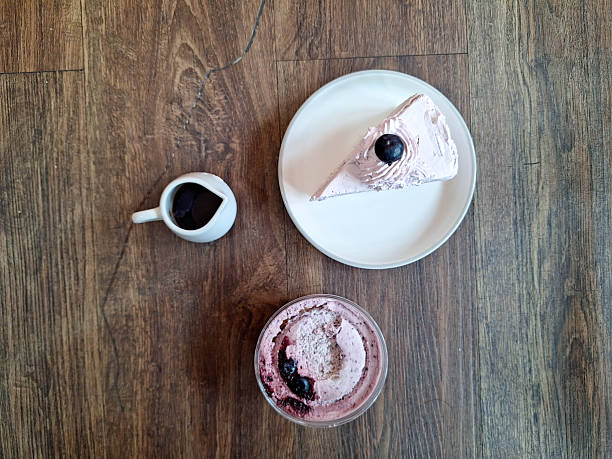 Blueberry Cheesecake and Blueberry Tiramisu Cream with fresh blueberries.  Dessert Menu. Top View.