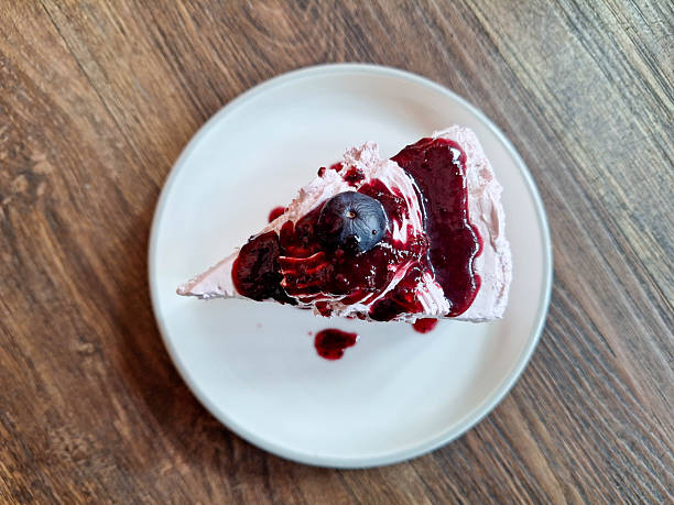 Blueberry Cheesecake with fresh blueberries.  Dessert Menu. Top View.