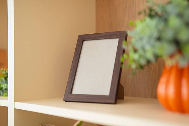 istock Picture frame mockup on shelf with autumn decor 2247897442