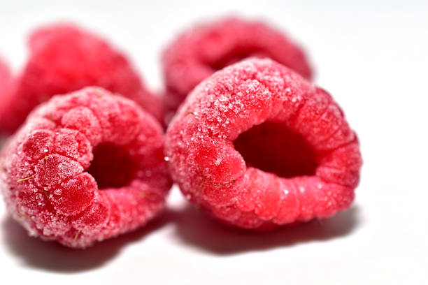istock Juicy frozen raspberries. 2247897696