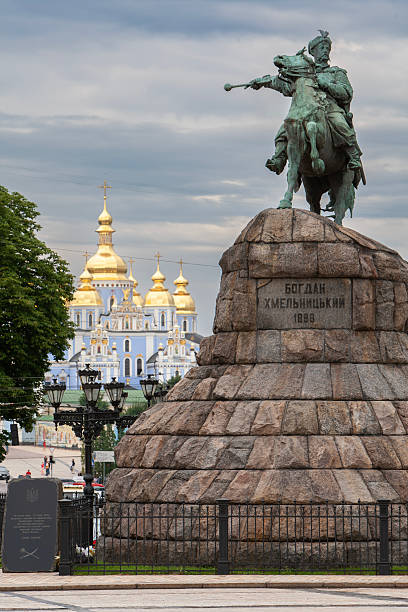 istock Famous historic bronze monument to Bohdan Khmelnytsky stands on Sofia Square against the golden domes of St Michael's Monastery in Kyiv Ukraine creating a classic city landmark view 2247898359