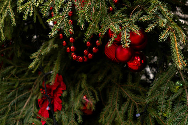 istock Christmas tree with many ornaments and pine cones. 2247904833