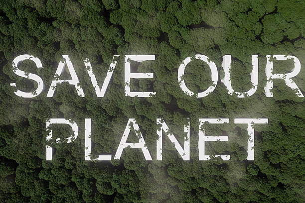 Urgent call to action to save our planet displayed over lush green forest