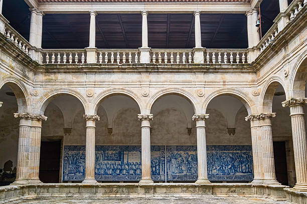 Cloister in the Viseu Cathedral, composed by two galleries, with azulejo tile panels created in the 18th century in the lower one, which represent scenes from the life of S. Teotónio, the patron saint of Viseu