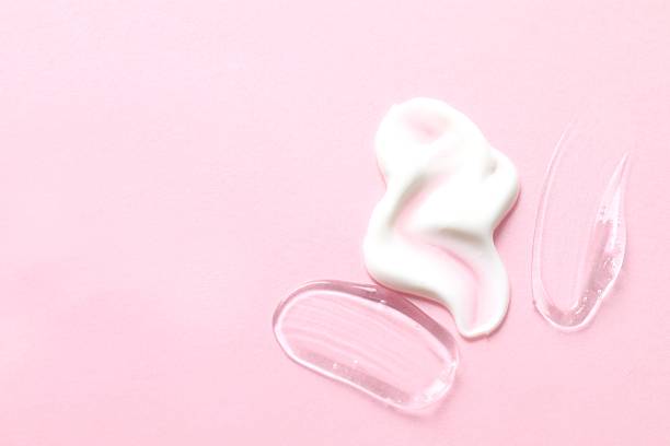 istock cosmetic smears cream texture on pastel pink background 2247924294