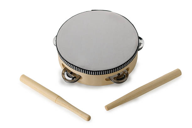 istock Tambourine with Two Wooden Sticks on White Background 2247925792