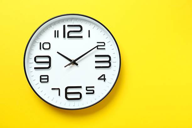 istock Big beautiful stylish clock on color background 2247927215