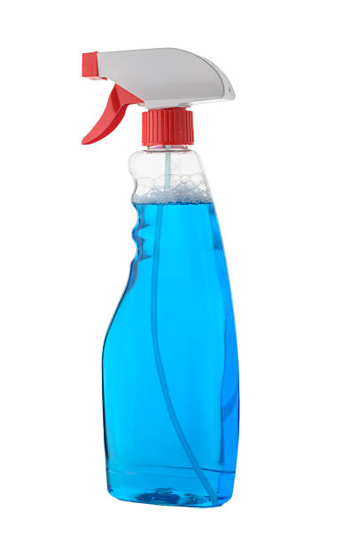 istock Blue Glass Cleaning Liquid in Spray Bottle on White 2247927668