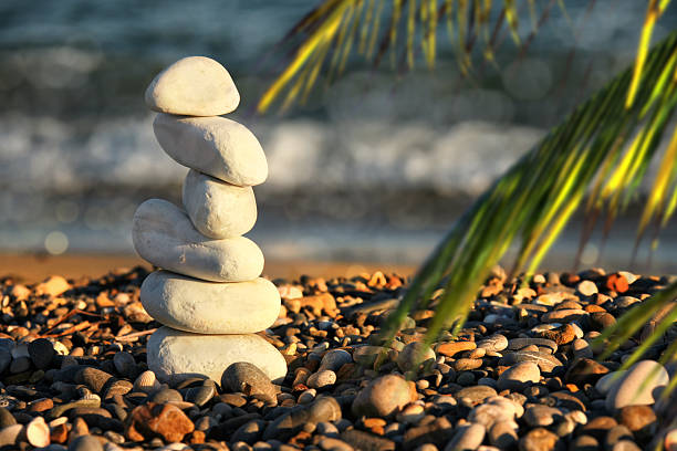 Balanced group of stones on beach