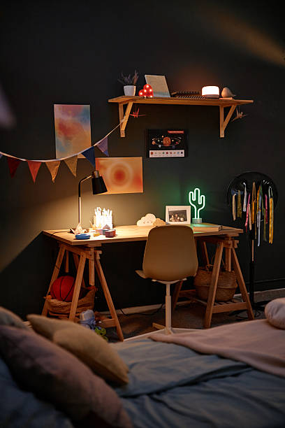 istock Cozy Evening Home Interior Showing Study Desk in Family Bedroom 2247933687