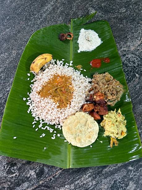 istock Onam sadya served on a banana leaf 2247936237