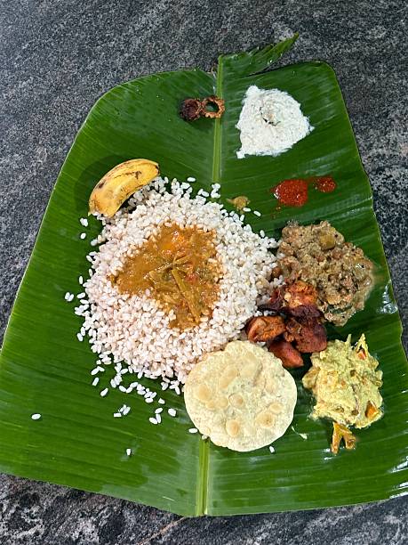 istock Onam sadya served on a banana leaf 2247936283