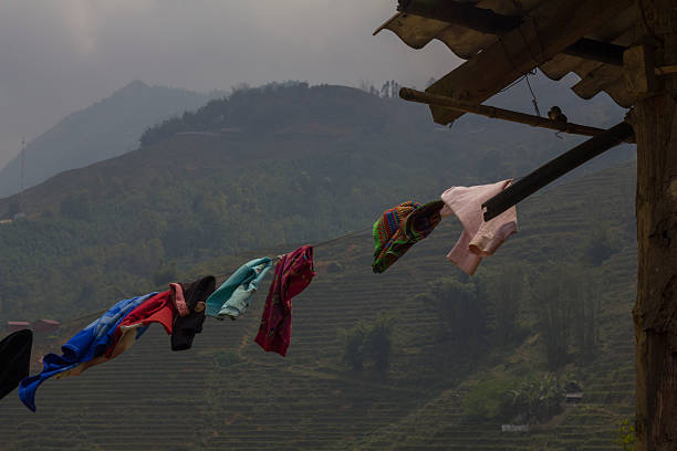 Rural Landscape with mountain house and drying clothes